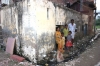 Sanju and his family in front of their home