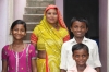 Tinku with his mother and siblings